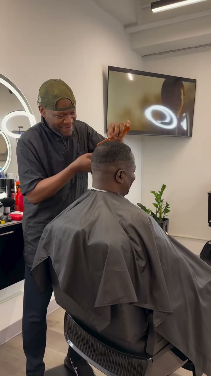Client with fresh lineup at Phoenix Barber Studio